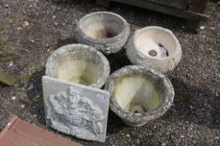 Four various concrete planters and a cast concrete