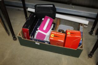 A box containing Leica camera manual, a Leica came