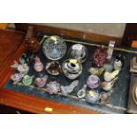 A quantity of various paperweights and glass bird