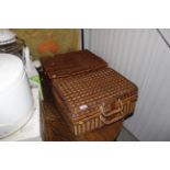Two wicker picnic baskets and contents