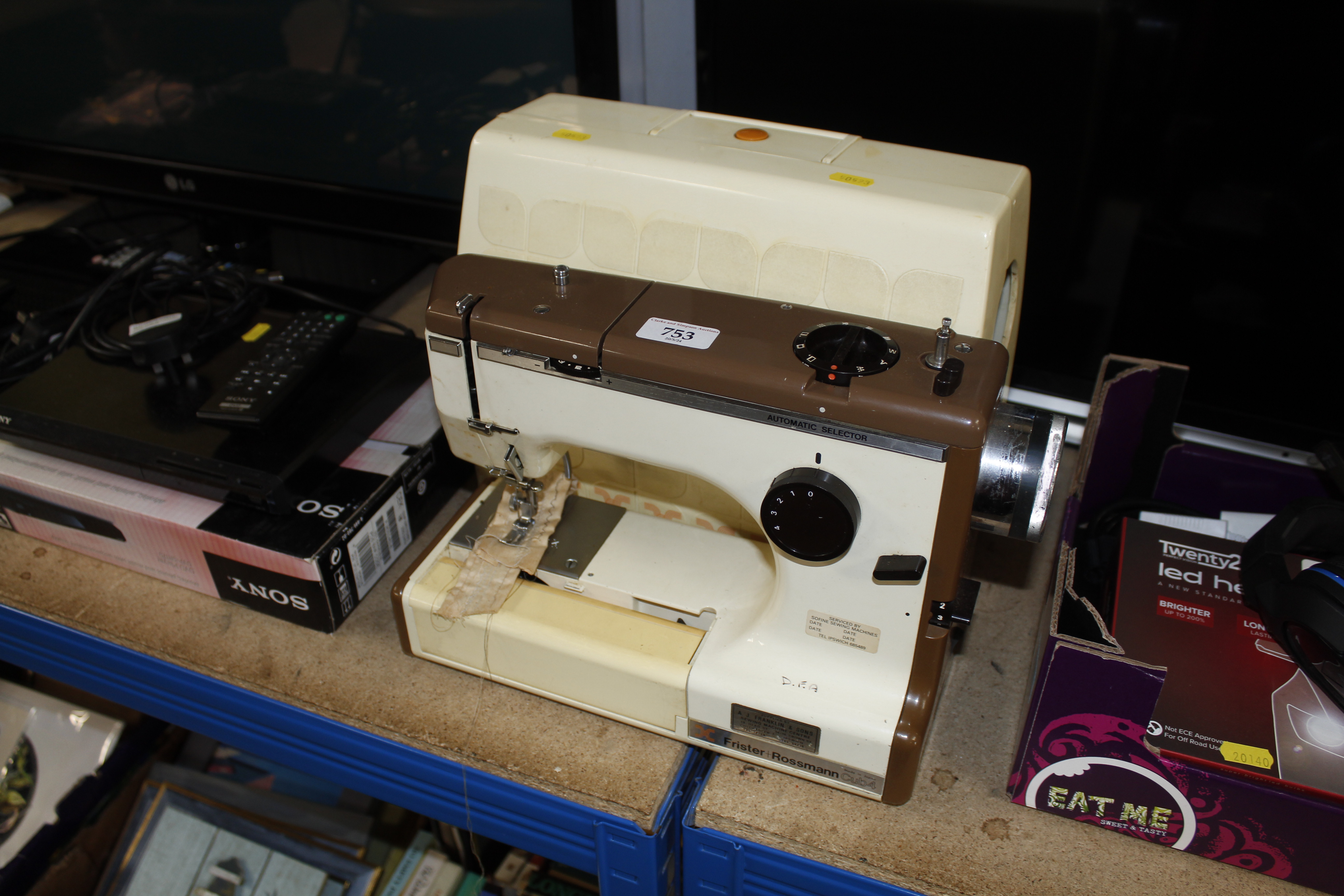 A Frister & Rossman electric sewing machine