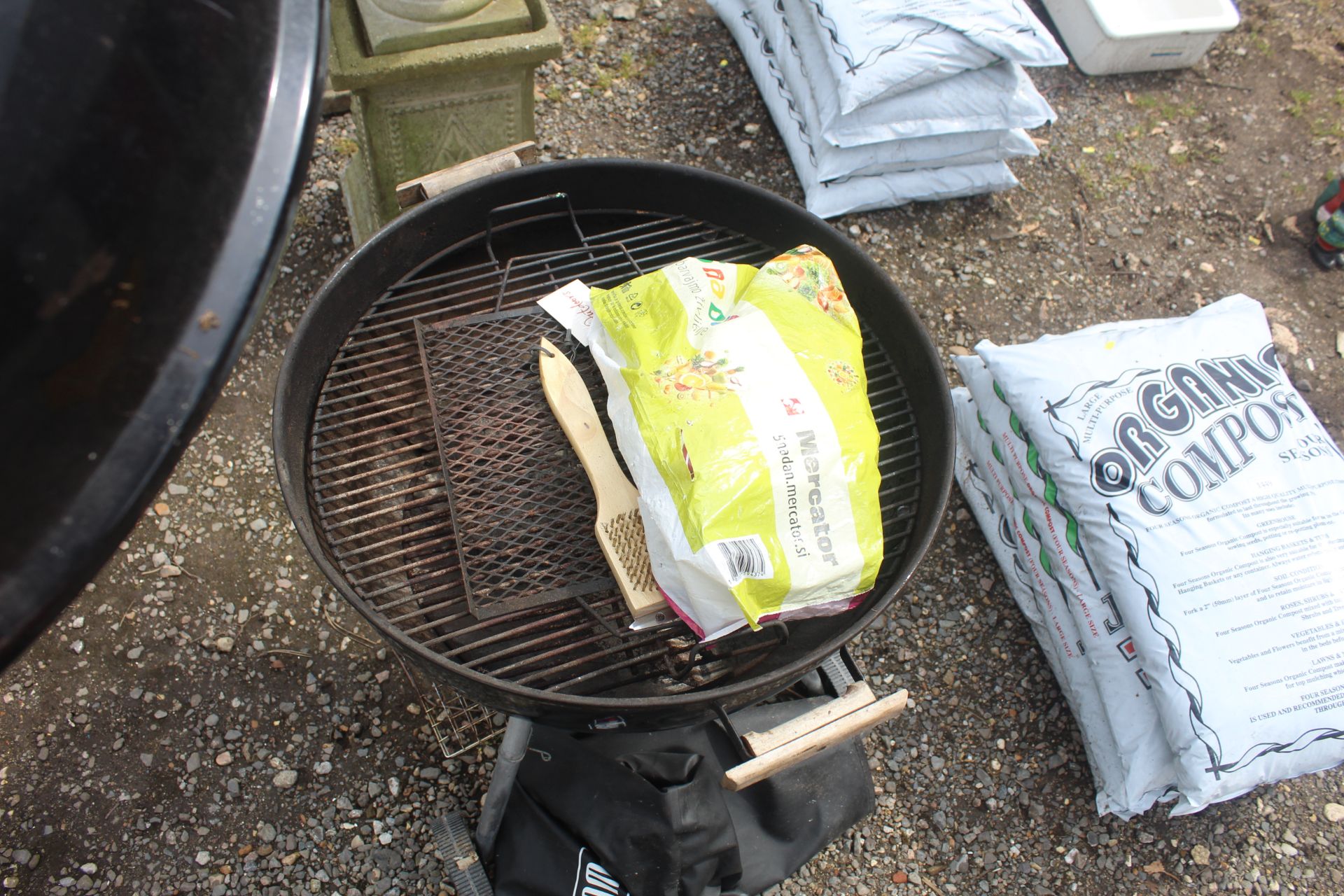 A Weber charcoal BBQ, various BBQ implements and a - Image 2 of 2