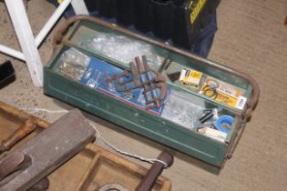 A metal cantilever tool box and contents of tools