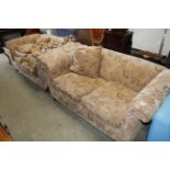 A pair of floral upholstered two seater settee