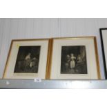 Two gilt framed black & white French prints