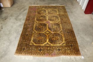 An approx. 7" x 4'5" patterned wool rug, AF