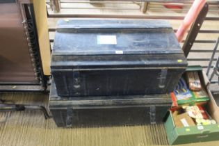 Two metal storage trunks with twin handles