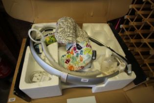 A 4Moms MamaRoo baby bounce chair in original box