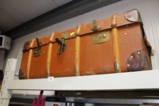 A vintage wooden bound travelling trunk