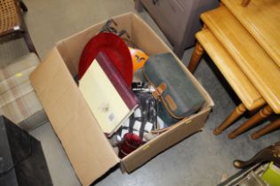 A box containing a Miranda camcorder and various s