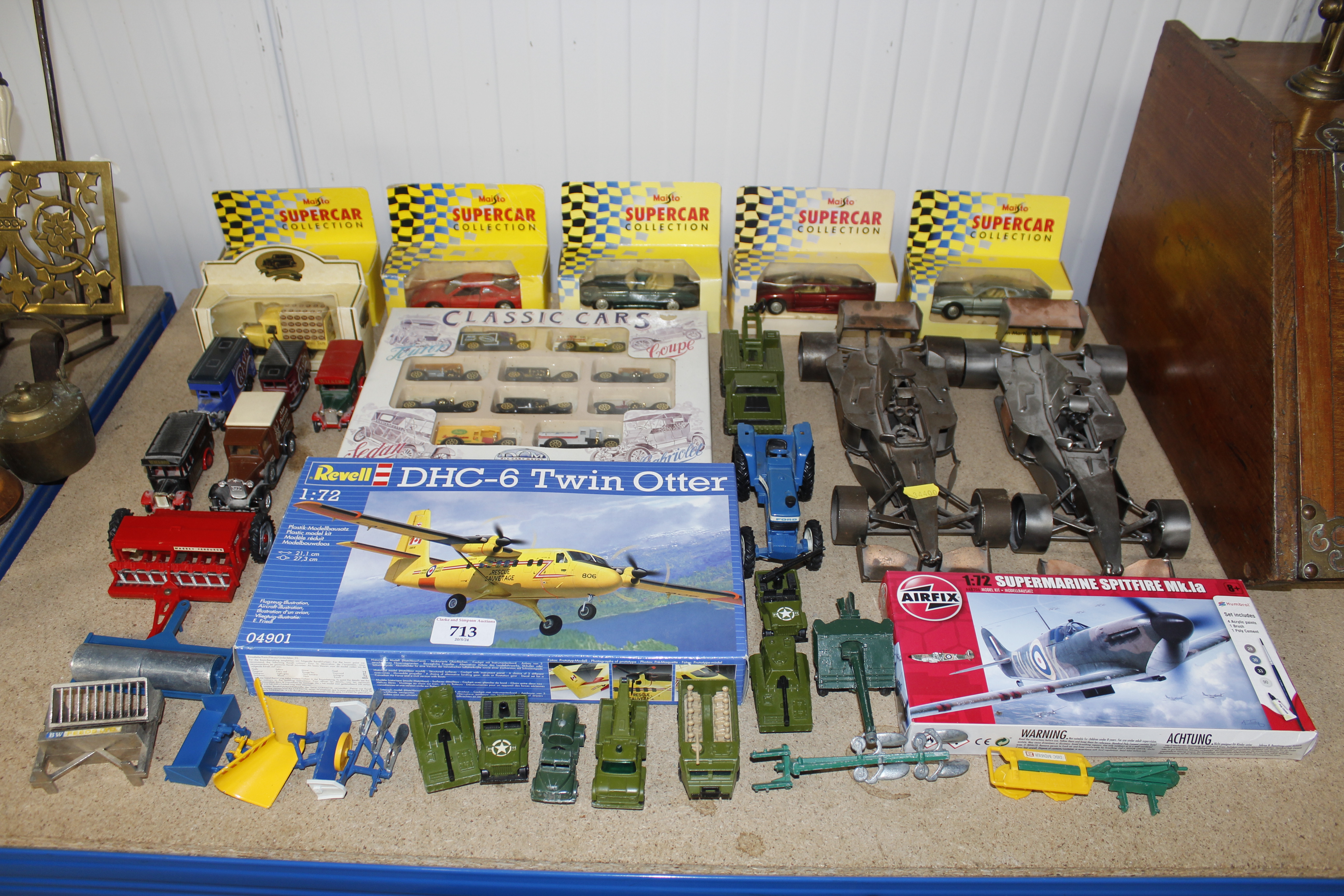 A collection of boxed and unboxed die cast model v