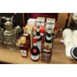A bottle of Johnny Walker Red Label Scotch whisky, two bottles of Extra Dry Martini, a bottle of