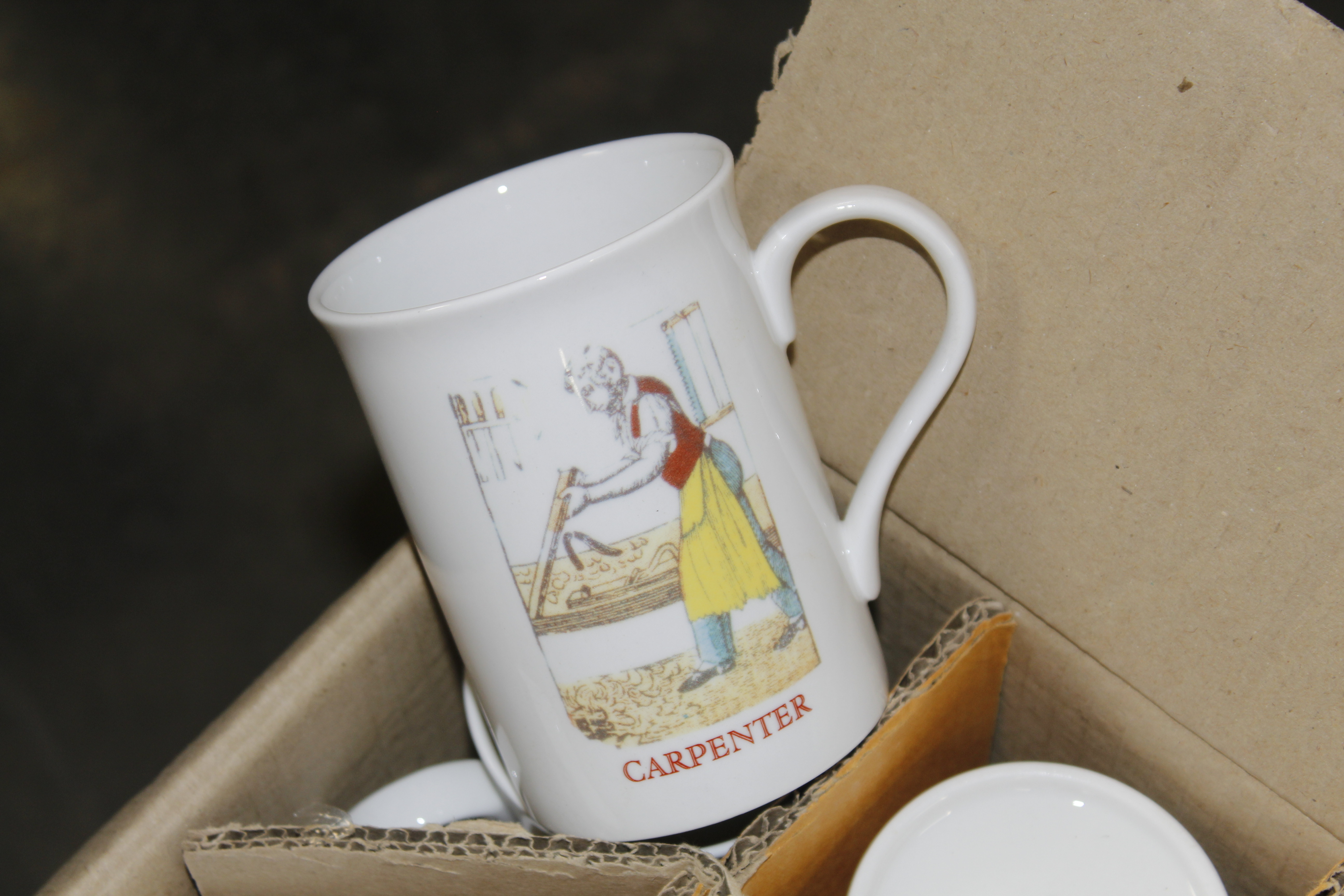 A box of fine bone china mugs 'The Carpenter' - Image 2 of 2