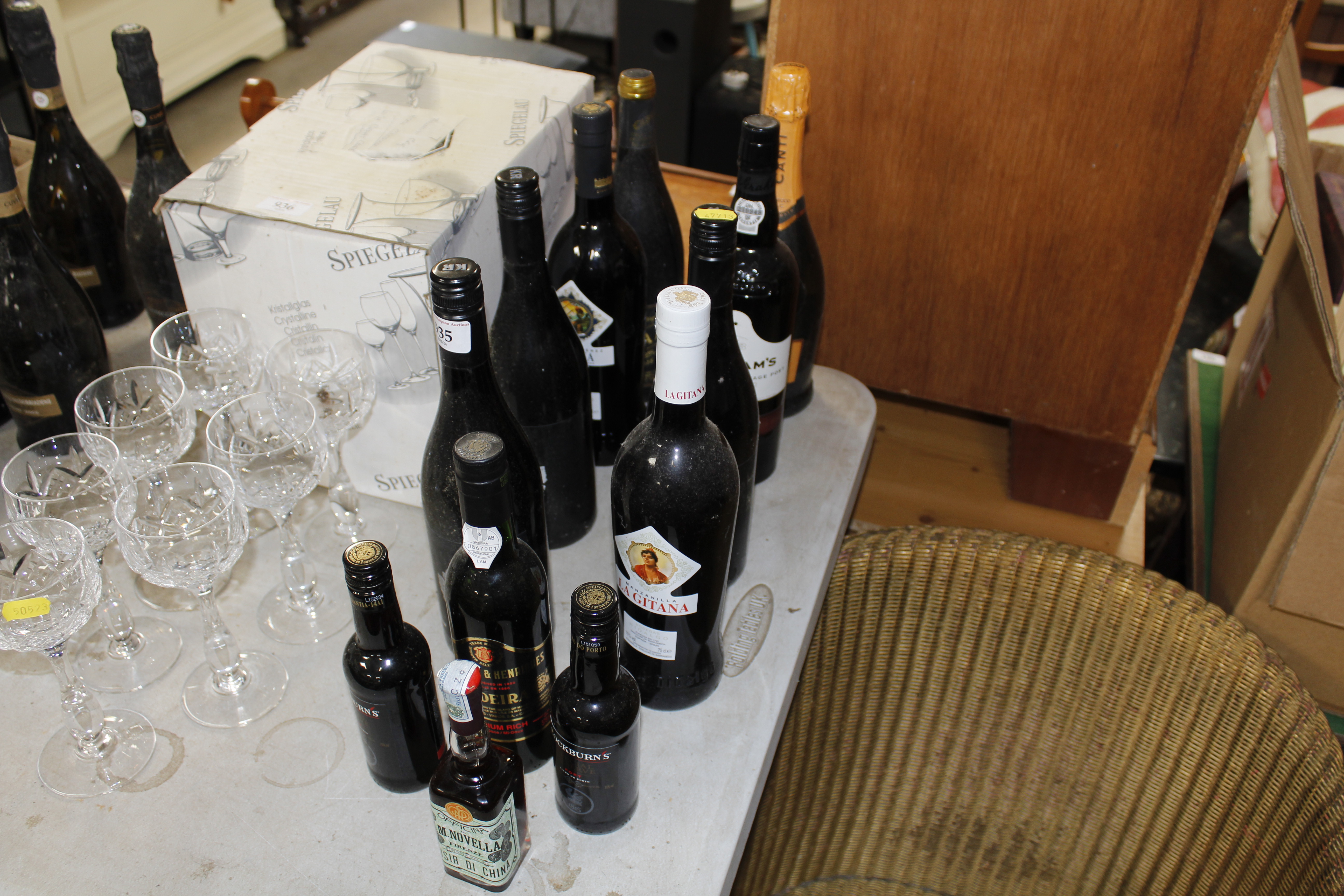 A bottle of Prosecco, a bottle of 2003 Grahams vintage port, wine etc.