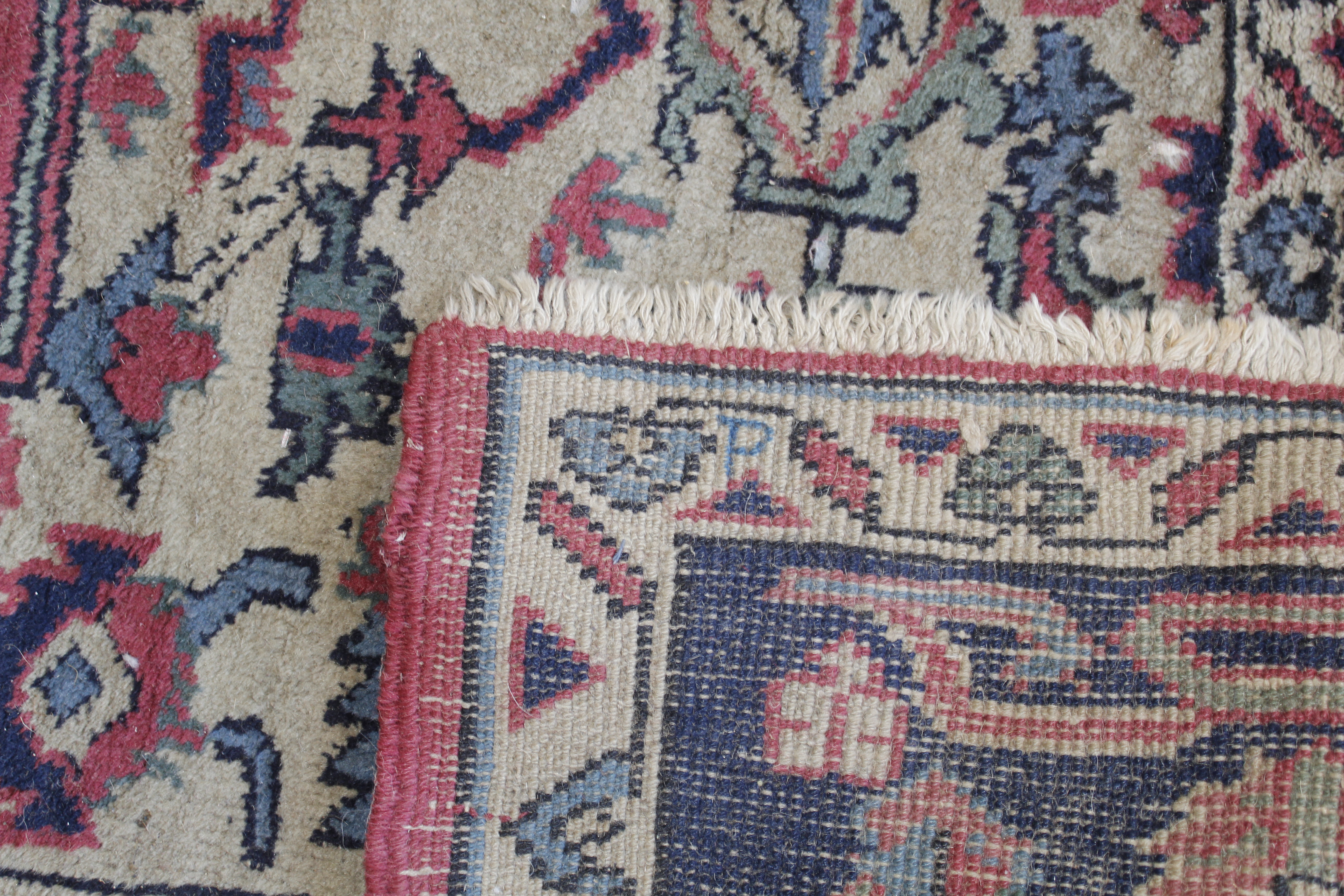 An approx. 9" x 6" blue and red patterned rug - Image 5 of 5