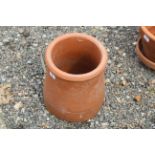 A terracotta chimney pot