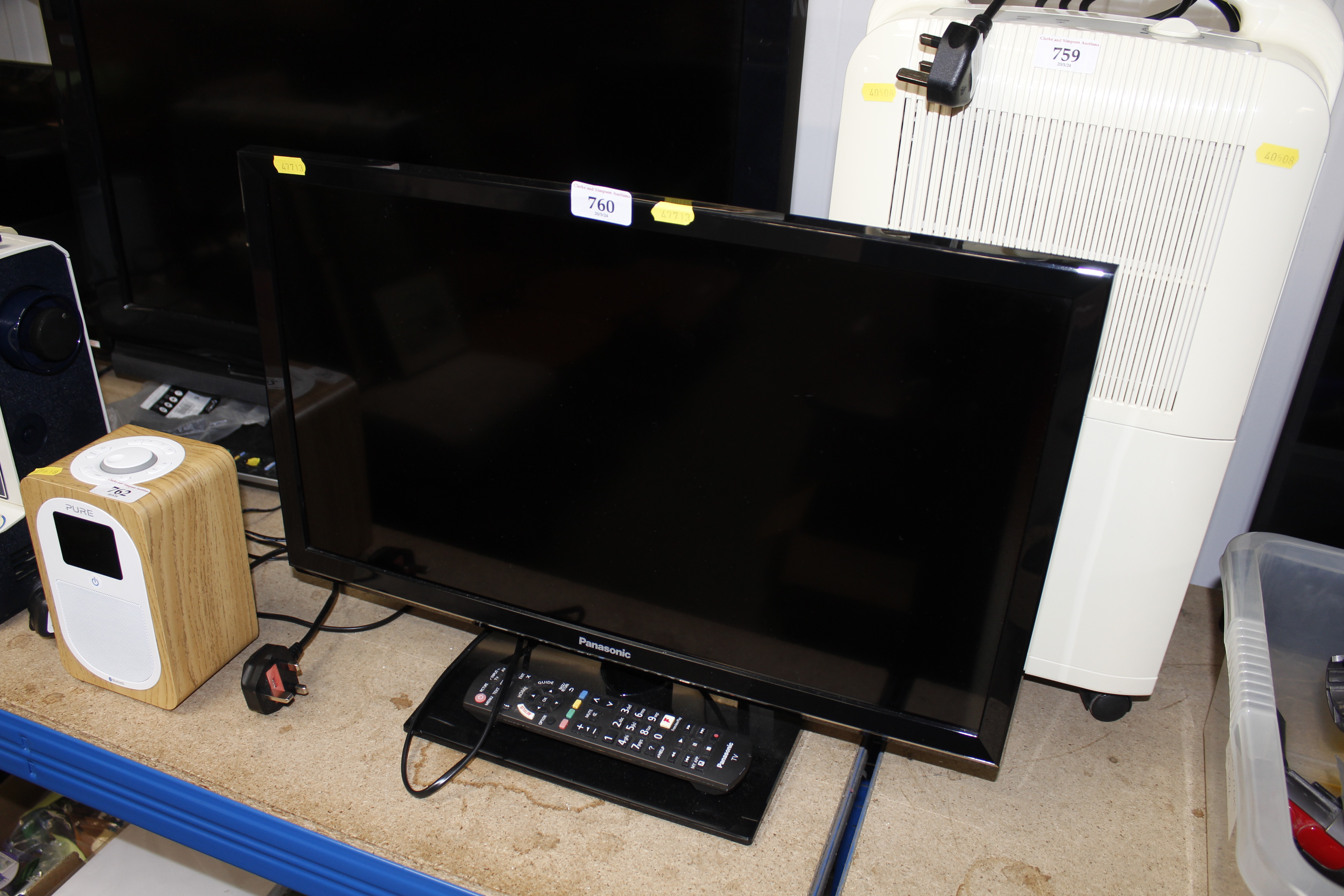 A Panasonic television with remote control