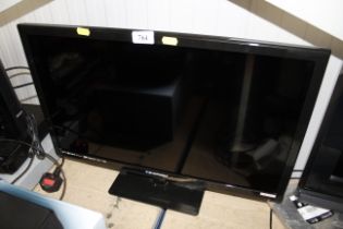 A Blaupunkt television with remote control and ins