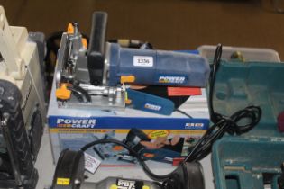 A Power Craft biscuit jointer with accessories, in