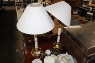 A pair of table lamps and shades