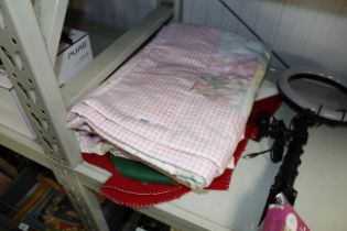 A patchwork throw and a large Christmas stocking