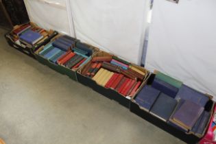 Four boxes of various books to include The Model E