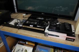 Two Sony DVD players, a Panasonic DVD player and a