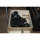 A pair of Rosemount ski boots and a pair of leathe