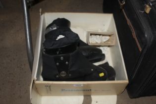 A pair of Rosemount ski boots and a pair of leathe