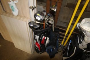 Two golf bags and quantity of clubs including a Ta