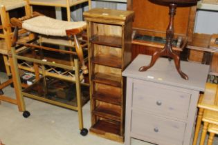 A hardwood open fronted CD storage unit