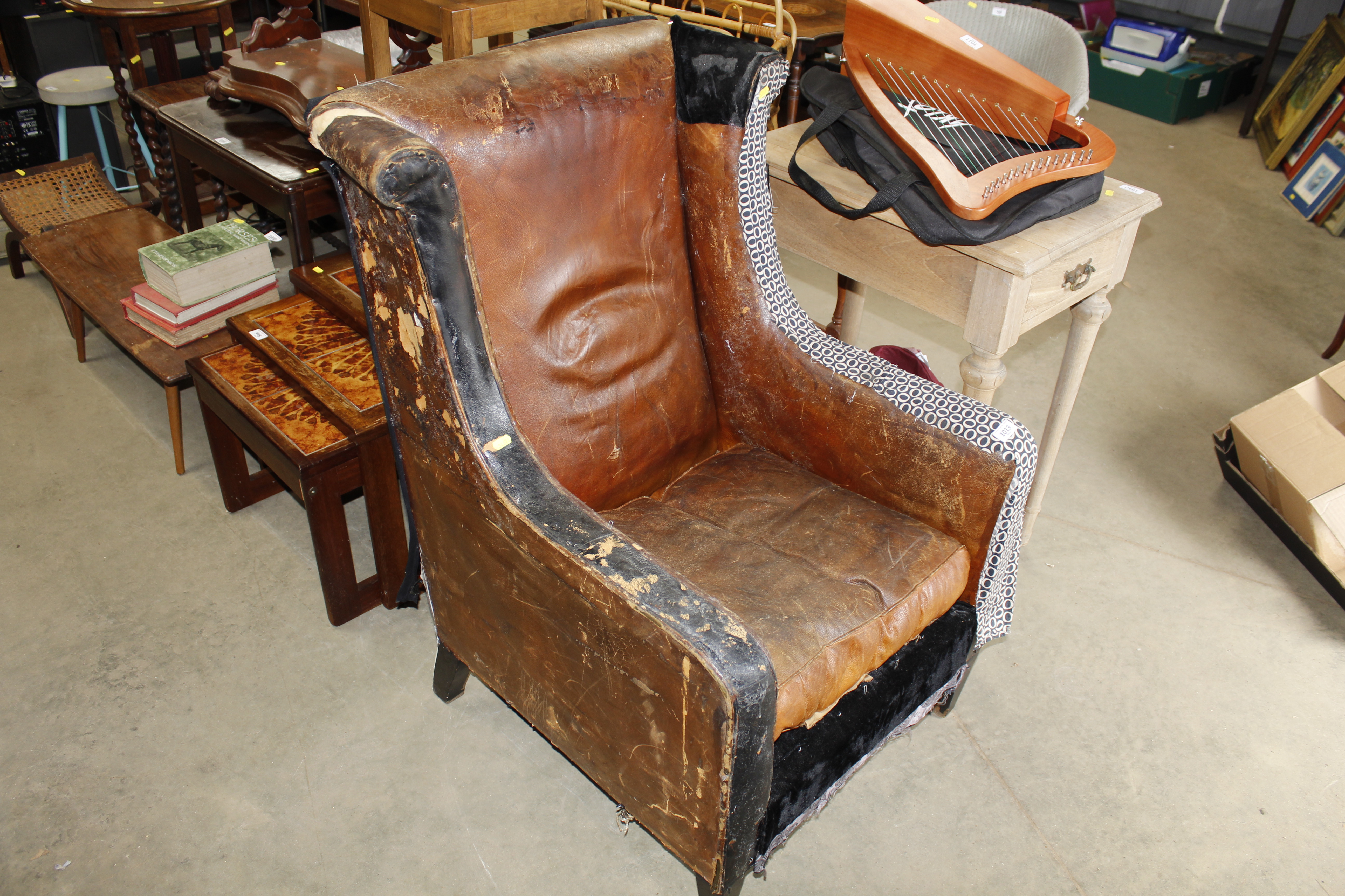 A leather upholstered armchair for restoration - Image 2 of 3