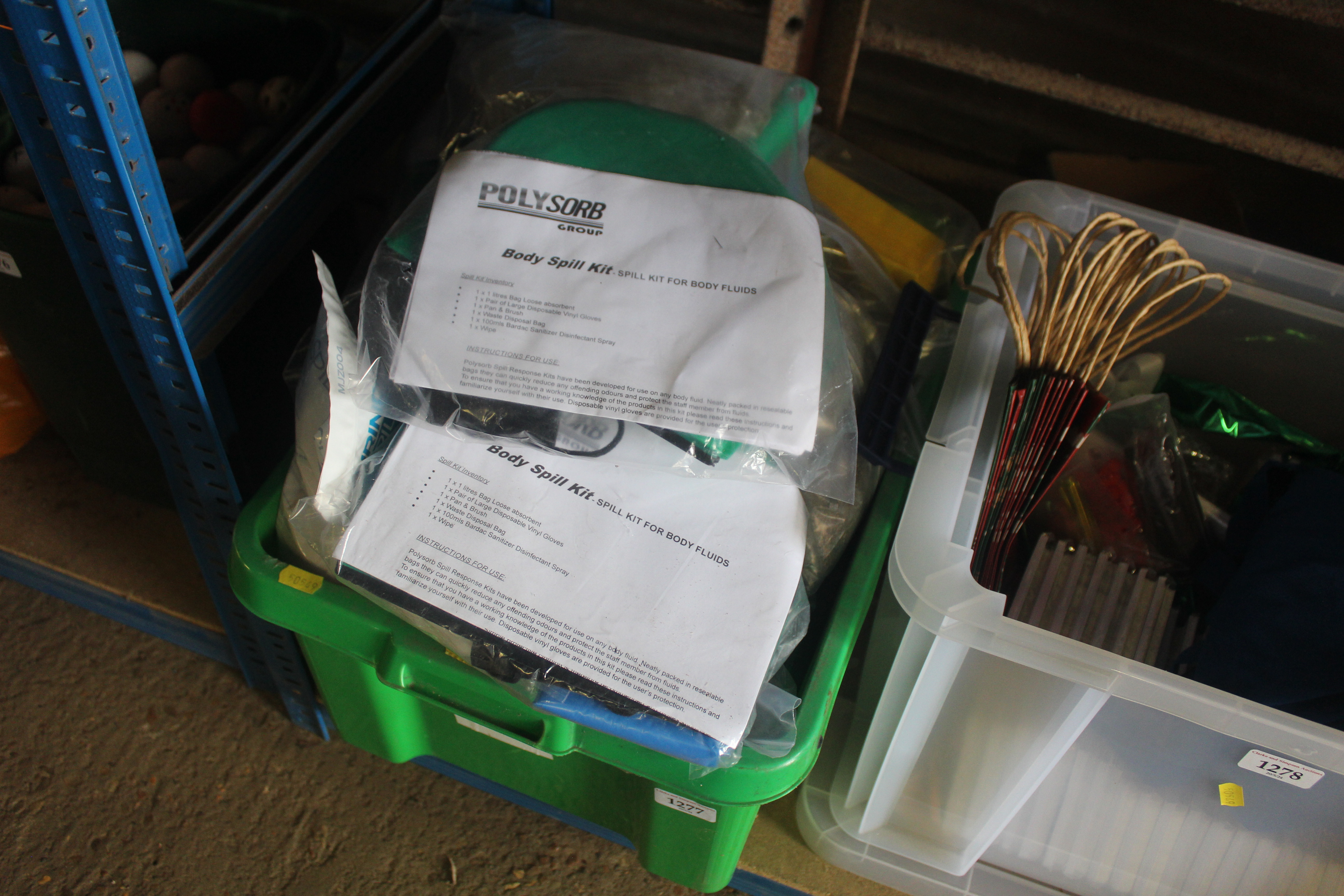 A box containing a quantity of body spill kits. Th