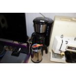 A Morphy Richards coffee maker and a Dualit milk f