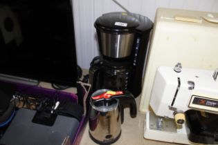 A Morphy Richards coffee maker and a Dualit milk f