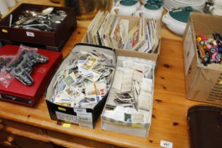 Three boxes containing cigarette and tea card albu