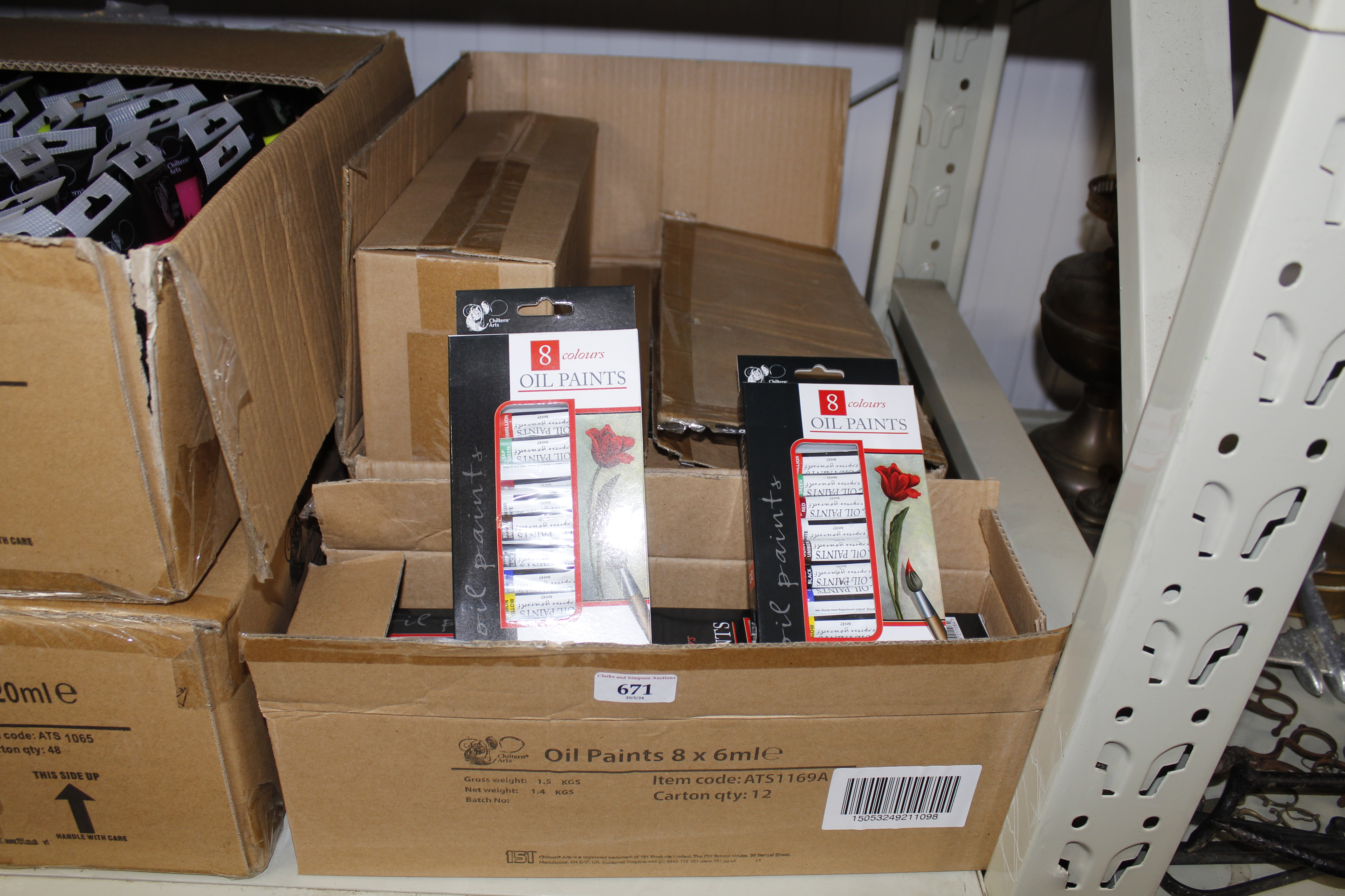 Five boxes containing sets of eight oil paints
