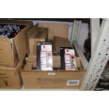 Five boxes containing sets of eight oil paints