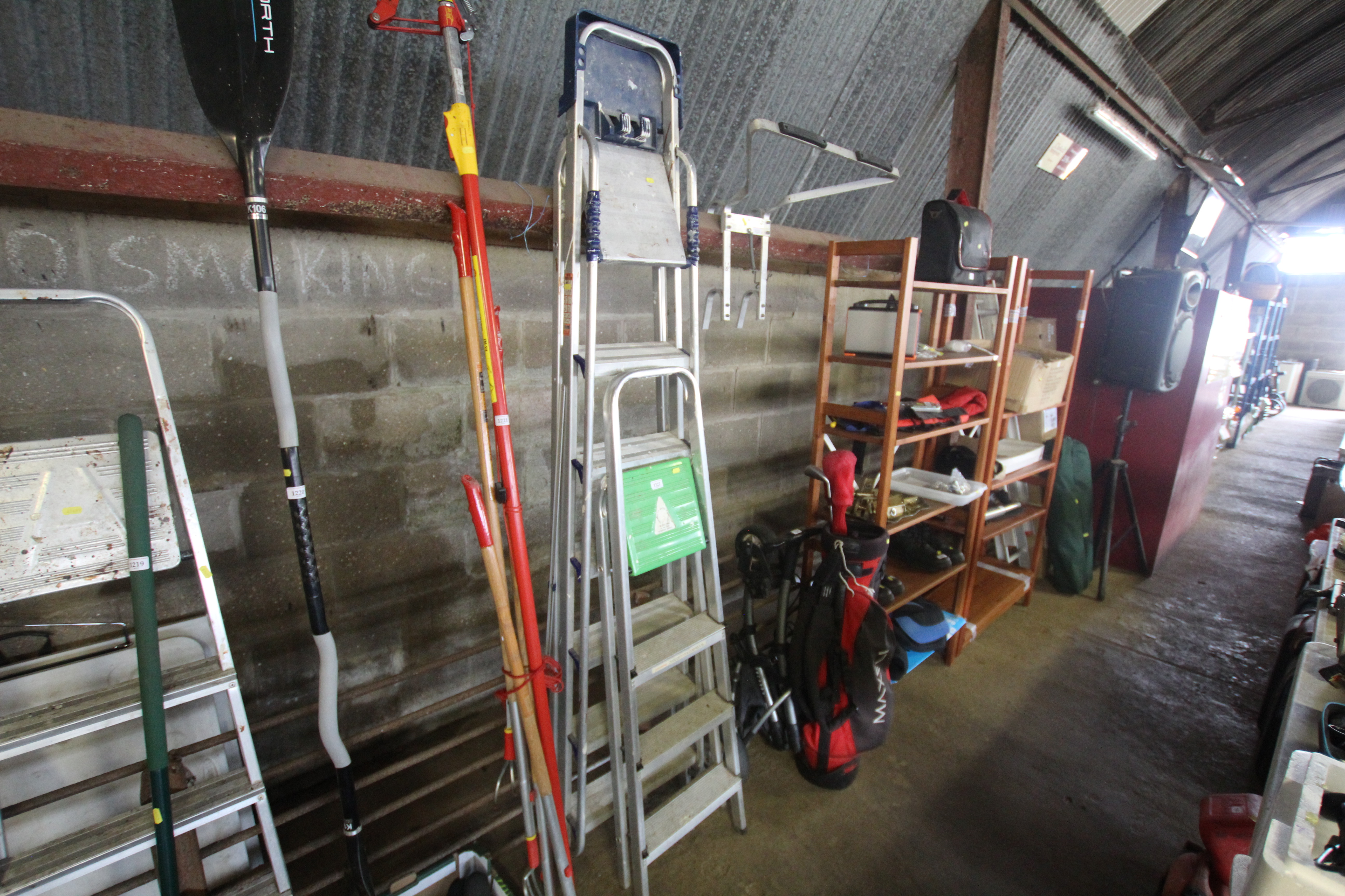 A large set of metal folding steps and one other