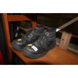 A pair of safety work boots (size 8)