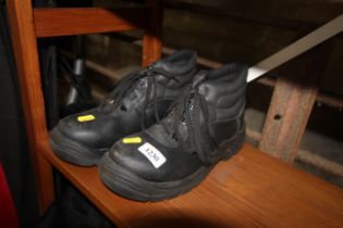 A pair of safety work boots (size 8)