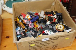 A box of die cast vehicles
