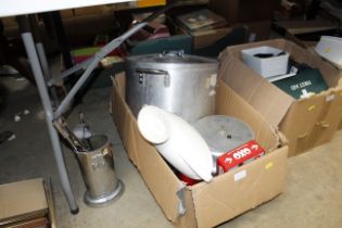 A box containing soda syphon, pressure cooker, lar