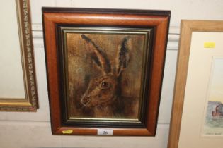 An unsigned oil on board depicting a brown hare