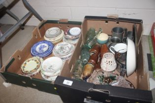 A box containing various vintage glass bottles, st