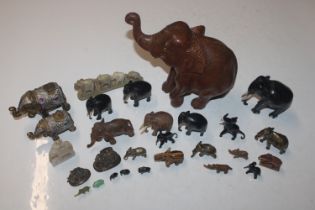 A box of elephant ornaments to include tigers eye