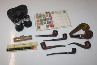 A silver mounted pipe; various other pipes; a case