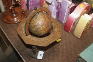 An early 20th Century table / desk globe on stand