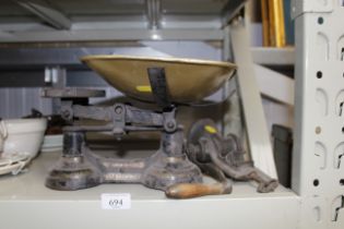 A set of vintage scales and a mincer