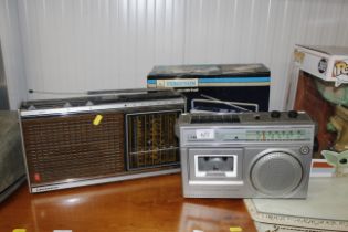 A Fergusson transistor radio and a Grundig similar